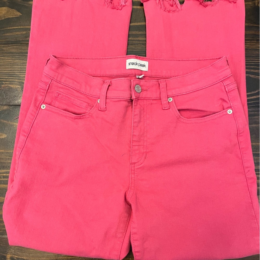 Pink distressed kick flare jeans